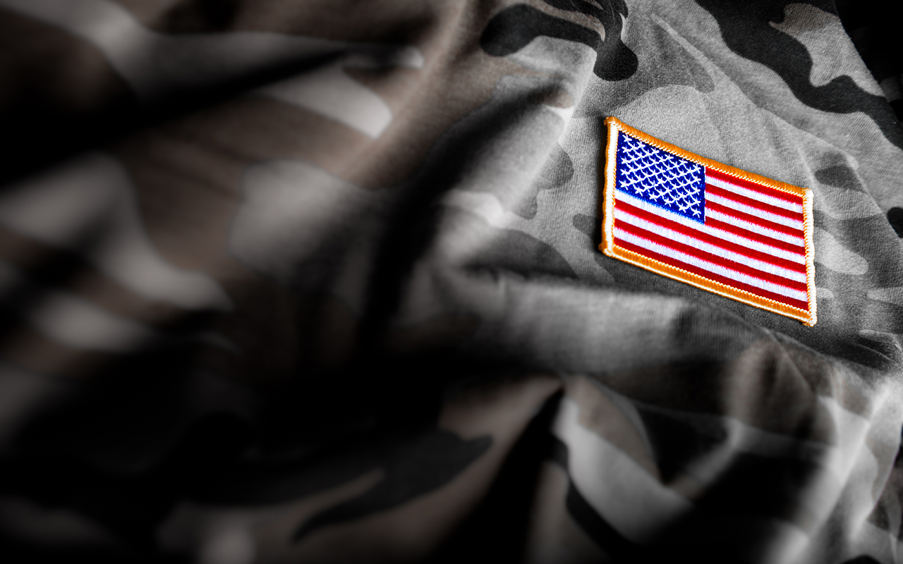 American Flag and Camoflage (Military Series) business-man-hold-car-house-key-with-euro-money-investment-future